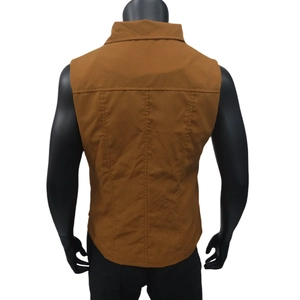Detailed back view of sleeveless vest jacket with stitching on dark camel fabric