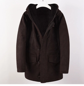 Detail view of winter brown suede parka featuring warm black lamb wool lining and hood