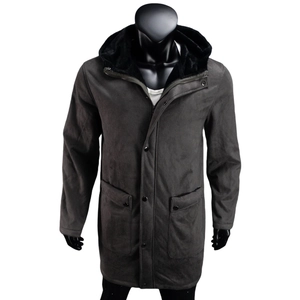 Detailed view of the warm faux fur lining and suede texture on men hooded winter parka coat