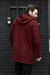 Close-up of a burgundy suede hooded jacket for men with sharp vertical stitching details