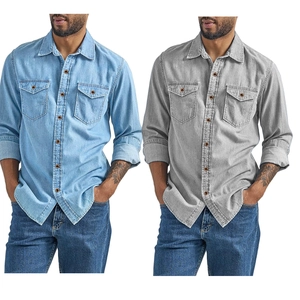 Detail of slim-fit denim shirts in light blue and grey with dual chest pockets and buttons