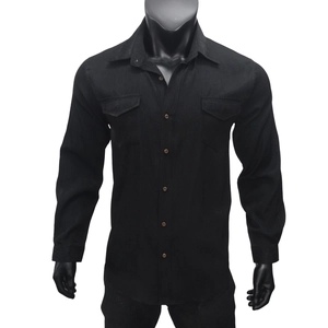 Close-up of black men's long sleeve shirt featuring dual breast pockets and brown buttons