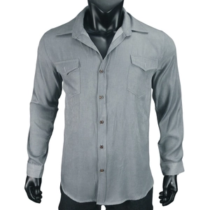 Detail of grey men's long sleeve shirt with dual chest pockets and textured fabric