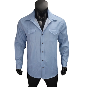 Close-up of light blue men's faux denim shirt with twin chest pockets and turn-down collar