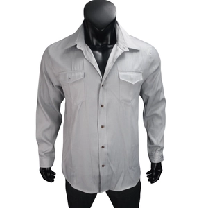 Detail of light grey long-sleeve shirt with turn-down collar and double chest pockets