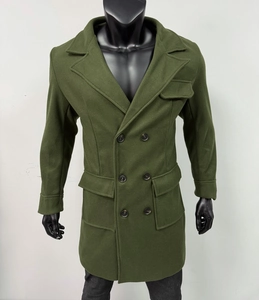 Detail view of olive green double-breasted wool coat with classic notched lapels