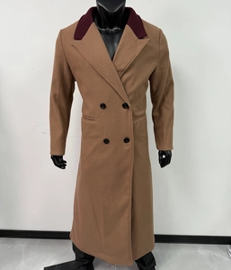 Detail of long double-breasted wool coat with burgundy contrast collar in camel