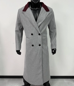 Close-up of men long wool coat featuring contrast burgundy collar and double-breasted buttons