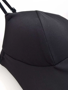 Detail of satin camisole showing cup stitching and adjustable thin shoulder strap