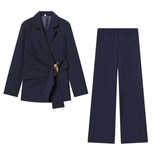 Navy blue two-piece blazer set for women with golden buckle and wide-leg trousers