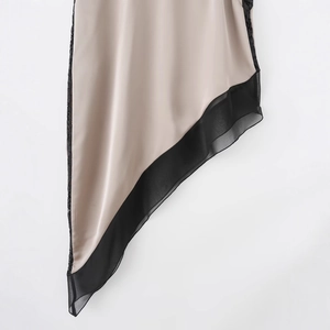 V-neck dress with khaki satin fabric, asymmetrical hem, and black lace patchwork detail