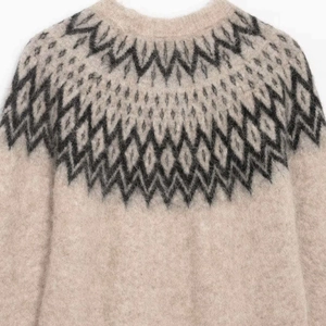 Winter Fair Isle knit sweater with beige crewneck and geometric jacquard pattern details
