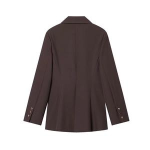 Macro shot of dark brown blazer back showing slim-fit seams and gold sleeve buttons