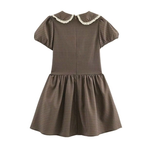 Back view of retro plaid dress with Peter Pan collar and white lace trim