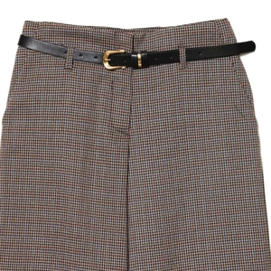 Classic high-waisted houndstooth wide-leg trousers with black belt and gold buckle