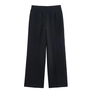 Detail shot of black high-waisted wide-leg dress trousers with a clean tailored waist