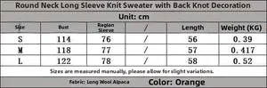 Size chart for orange crewneck sweater with back knot detail and alpaca wool fabric specs