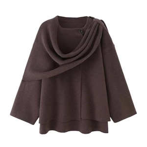 Brown knit poncho sweater with asymmetric layered hem and buttoned scarf collar