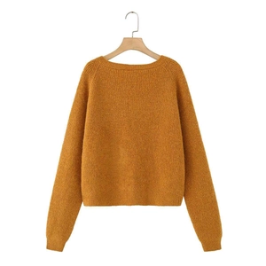 Fashionable ginger orange knit sweater with crew neck and long sleeves for autumn style