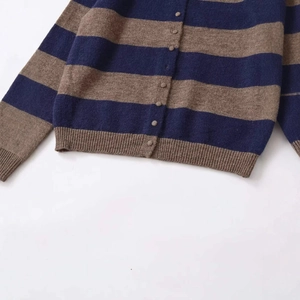 Classic navy and tan striped knit cardigan with front button closure and ribbed edges