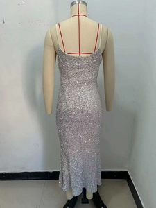 Close-up of shimmering silver sequins and fine strap detail on this elegant evening dress