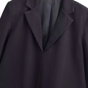 Fashionable black blazer dress for women with notched lapel and sleek professional design