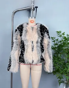 Detail of multi-color faux fur jacket with black, gray and pink faux fur stripes