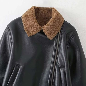 Black faux leather biker jacket featuring contrast brown shearling collar and zip detail