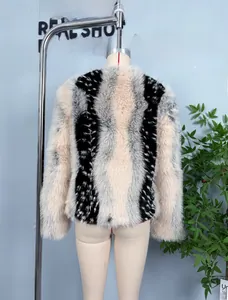 Detail of premium faux fur jacket featuring thick multi-color vertical striped texture