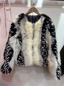 Detailed close-up showing the soft faux fur texture and vertical color patchwork design