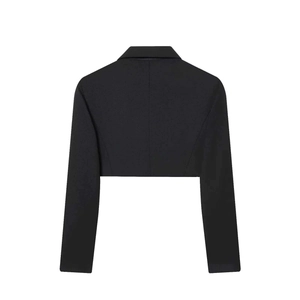 Back view of a cropped black blazer jacket with sharp tailoring and dense texture