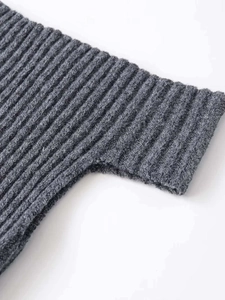 Macro shot of charcoal grey rib-knit fabric texture on short sleeve knitted top