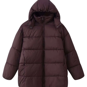 Oversized chocolate brown quilted puffer coat with high neck hood and loose fit