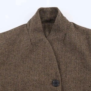 Brown herringbone casual blazer with lapel collar and detailed button texture