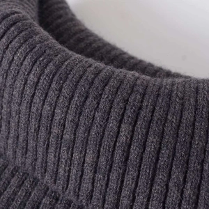 Women's minimalist charcoal grey rib-knit turtleneck sweater with premium texture
