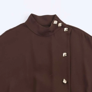 Deep brown high neck dress with decorative gold irregular buttons and matching waist belt