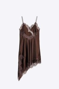 Detailed close-up of dark brown satin dress with intricate eyelash lace trim and silk finish