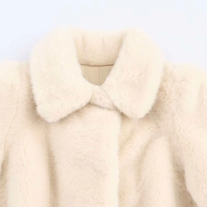 Elegant cream faux fur coat featuring a plush lapel collar and soft premium texture