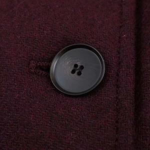 Classic dark burgundy wool coat featuring elegant black four-hole buttons for a timeless look