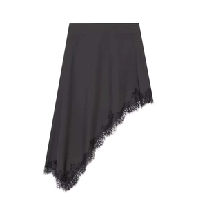 Chic black asymmetrical skirt featuring delicate eyelash lace trim on a minimalist white backdrop