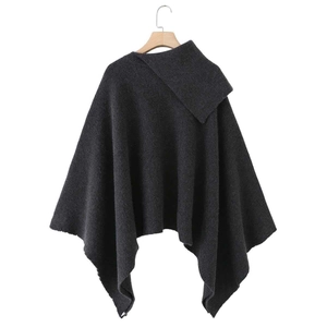Asymmetric lapel knit poncho in charcoal grey with thick vertical textured ribbing