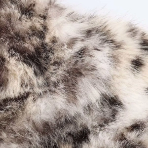 Detailed close-up showing soft grey and black animal print faux fur texture and long fibers