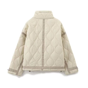 Chic beige quilted jacket with stand collar and wavy stitching for winter fashion