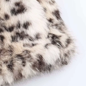 Macro shot of faux animal fur texture with soft leopard print in neutral tones