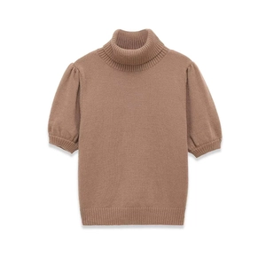Detailed view of brown knit sweater featuring high neck and stylish puff sleeves