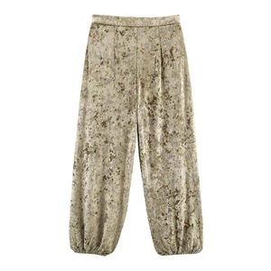 Pantalones de terciopelo metalizado para mujer con cintura alta y textura de mármol