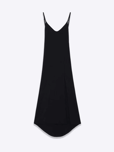 Detail of a black maxi slip dress with deep V-neckline and ultra-thin spaghetti straps