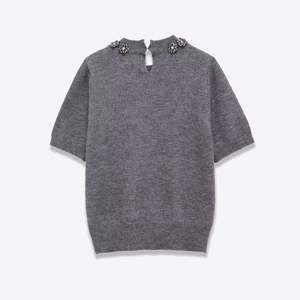 Grey short sleeve knit top with crystal flower neck trim and water-drop back opening