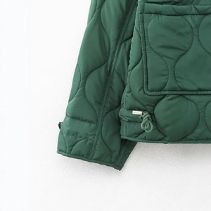Quilted dark green winter jacket featuring adjustable drawstring hem and wave pattern