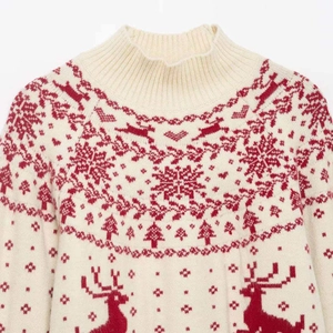 Winter mock neck sweater with festive red reindeer and snowflake jacquard patterns